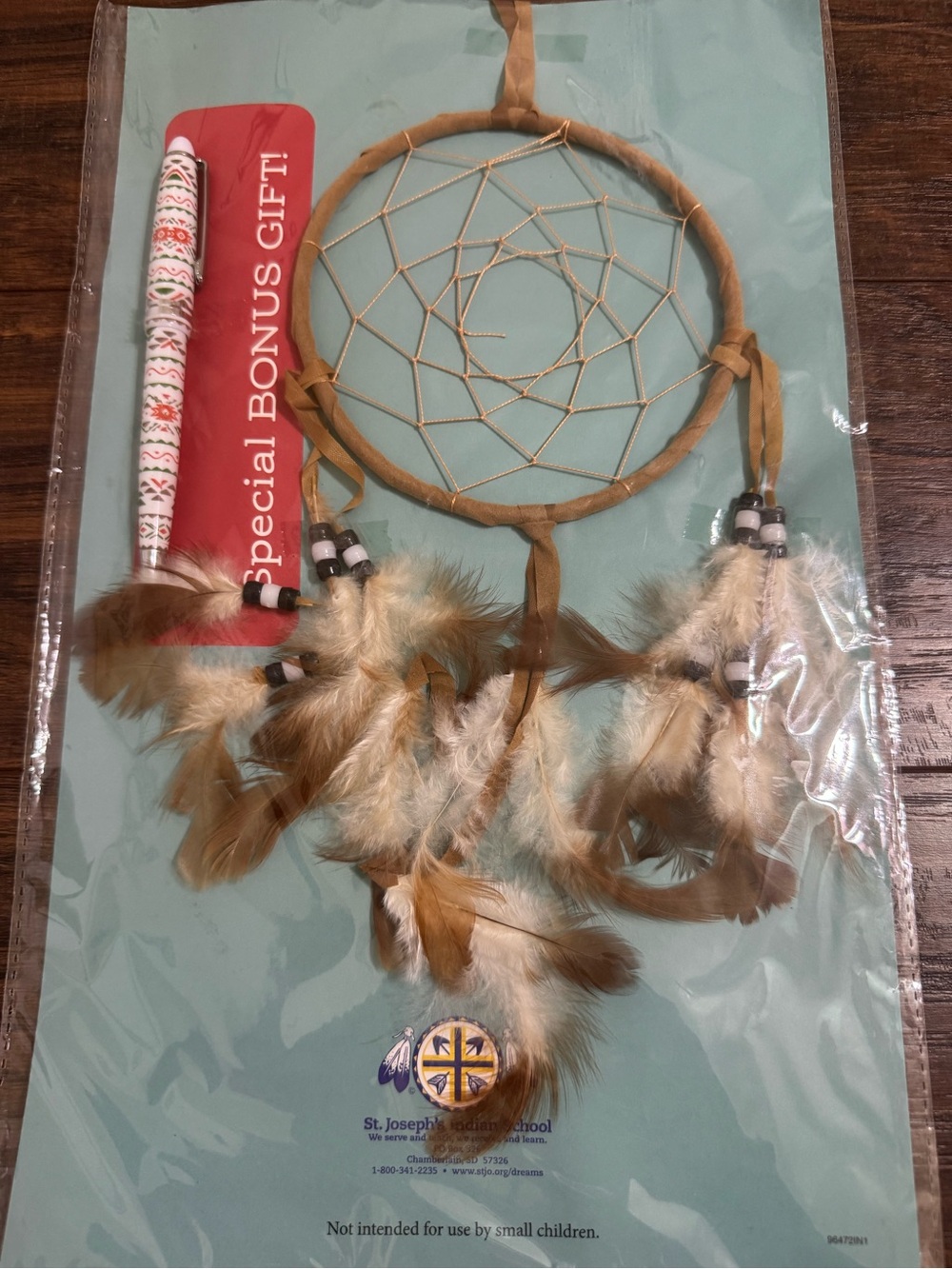 dreamcatcher legend 4 3/4” round with bonus writing pen sealed new